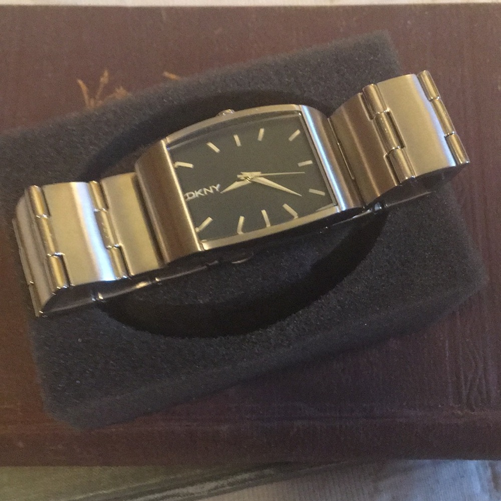 DKNY Men’s stainless steel watch. Brand New in box, no tag.
